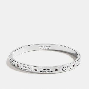 coach silver signature hinged bangle